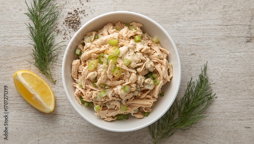 Chicken Mayo Salad in a White Bowl. Shredded Roast Chicken in Creamy Mayonnaise with Herbs. Light Lunch Idea.