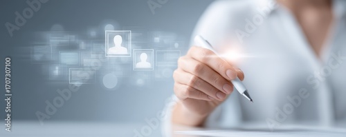A business professional using a pen and digital interface to connect with virtual profiles for networking and communication.