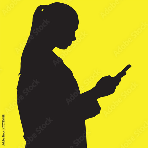 silhouette of a beautiful girl is using phone