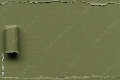 Torn green paper on a green screen background