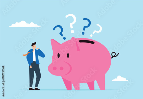 Confused businessman with piggybank and question marks