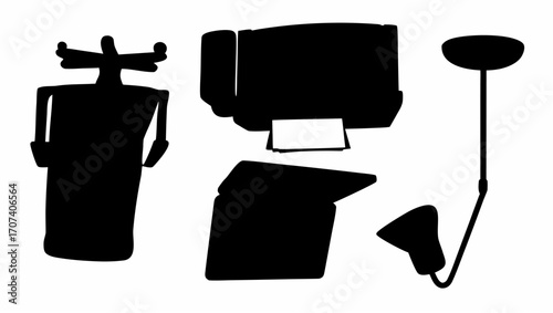 Black silhouette of a figure with head ornaments next to a computer and lamps on a white background