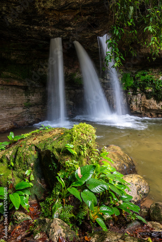 Beautiful view to water coming out of holes in Pedra Furada waterfall