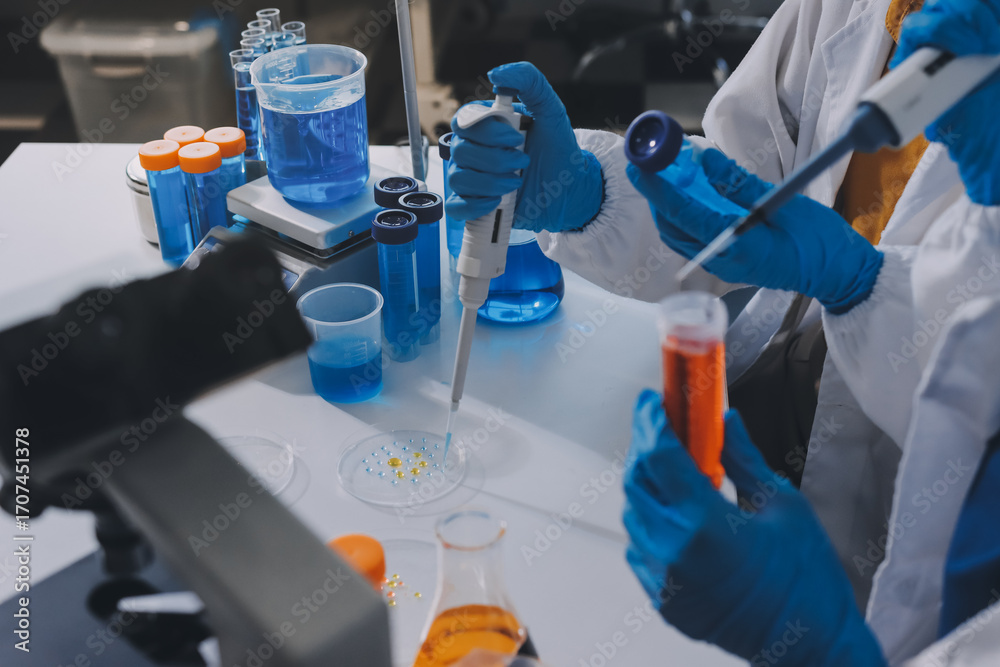 Fototapeta premium Collaboration, tablet or science with people in lab together for research or development. Innovation, tech and microscope with scientist team in clinical trial for planning or medical investigation