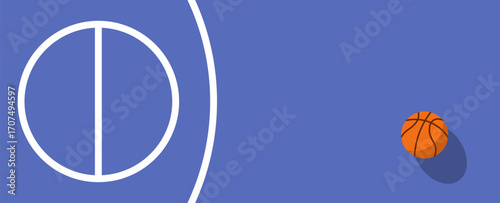 A basketball ball rolls across a blue court area.