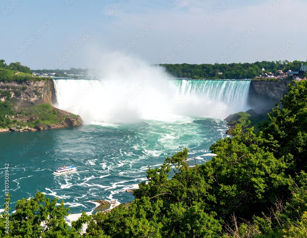 Fototapeta premium Majestic waterfall cascading over cliffs into churning river, viewed from a lush green vantage point