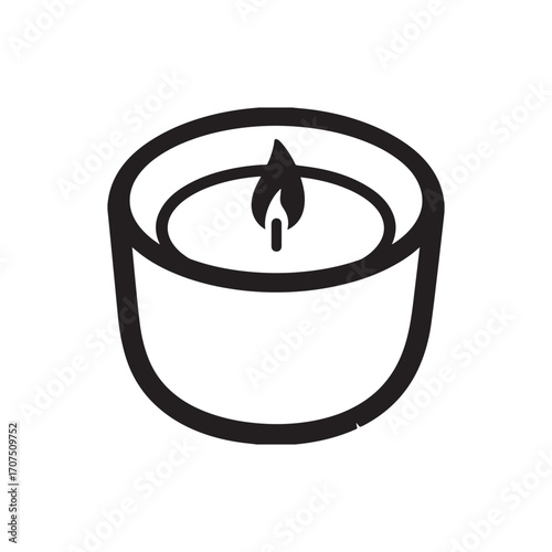 Silhouette of a small candle inside a cup. The candle is low and round with a small flame. 