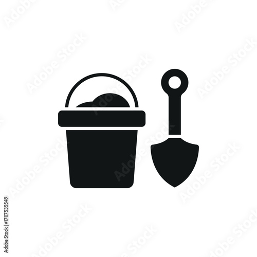 Bucket and spade with sand icon in glyph for simple summer and holiday graphics.