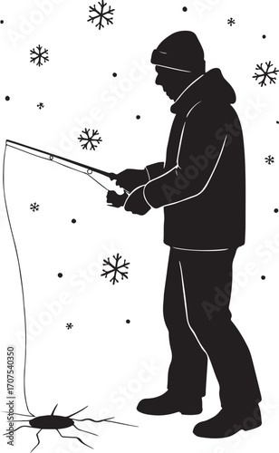 Silhouette of man ice fishing with snowflakes falling