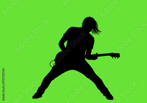 A black silhouette shows a person playing an electric guitar with their legs spread set against a bright green background