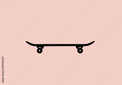 A black skateboard with wheels stands out against a plain light peach background