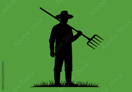 A farmer silhouette stands with a pitchfork over his shoulder in a green field