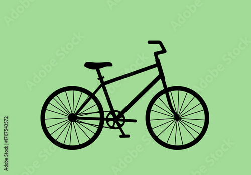 A silhouette of a bicycle against a light green background