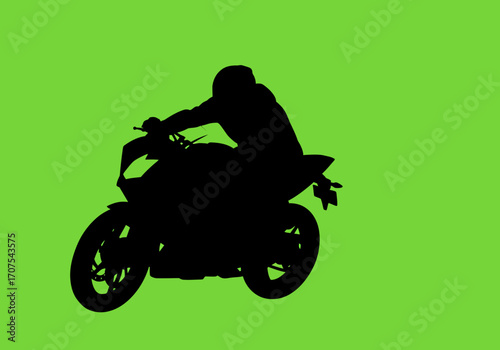 A person on a motorcycle in silhouette against a green background