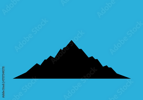 Black mountain silhouette against a blue background Jagged peaks visible
