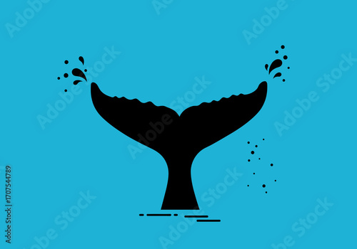 Black whale tail above water with splashes on a light blue background