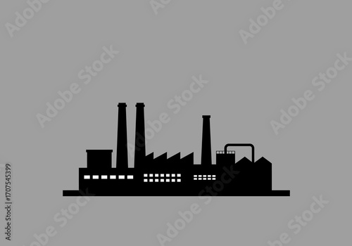 Silhouette of a factory with chimneys and visible windows against a gray background