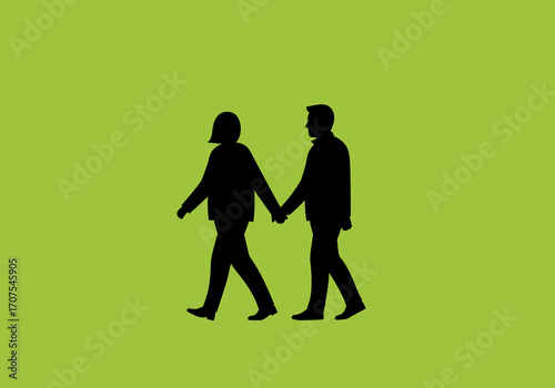 Silhouetted couple walks handinhand against a light green background