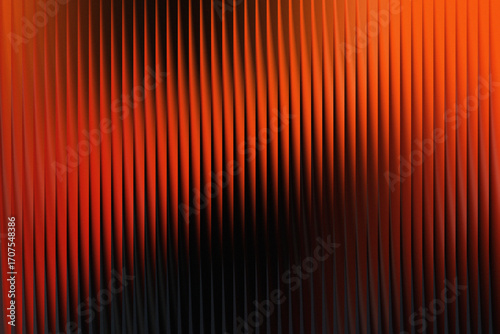 Abstract orange and black vertical lines create a visually striking pattern