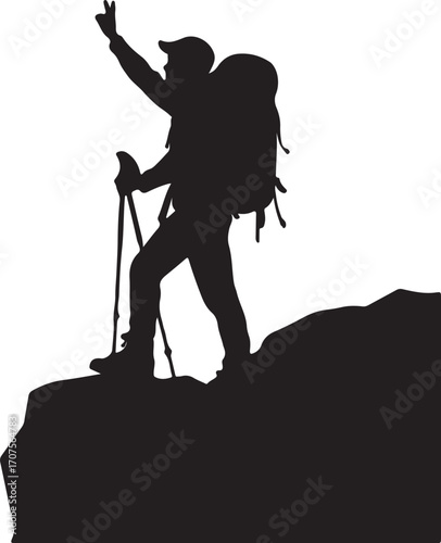 Silhouette of hiker with backpack and trekking poles on rocky peak