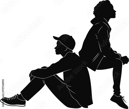 Two young people sitting back to back silhouette