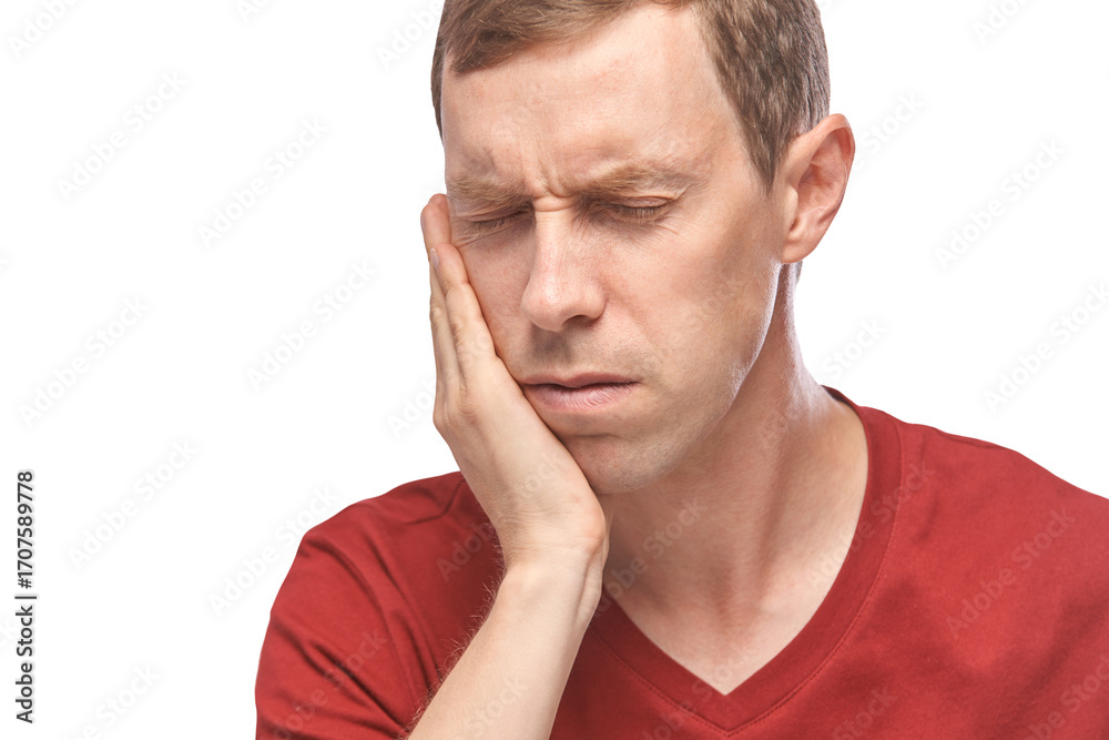 Fototapeta premium Adult caucasian male with toothache holding jaw in pain on isolated background.