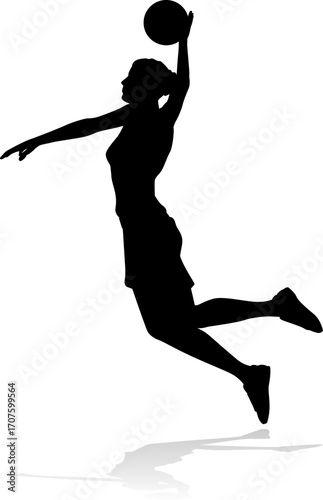 Silhouette of athletic woman female basketball player with basketball ball. Sports concept.
