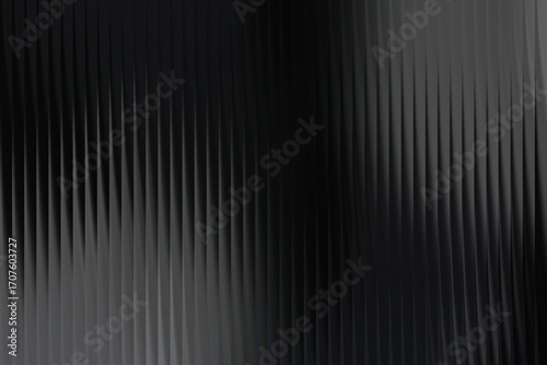 Dark abstract background with vertical stripes and subtle textured pattern