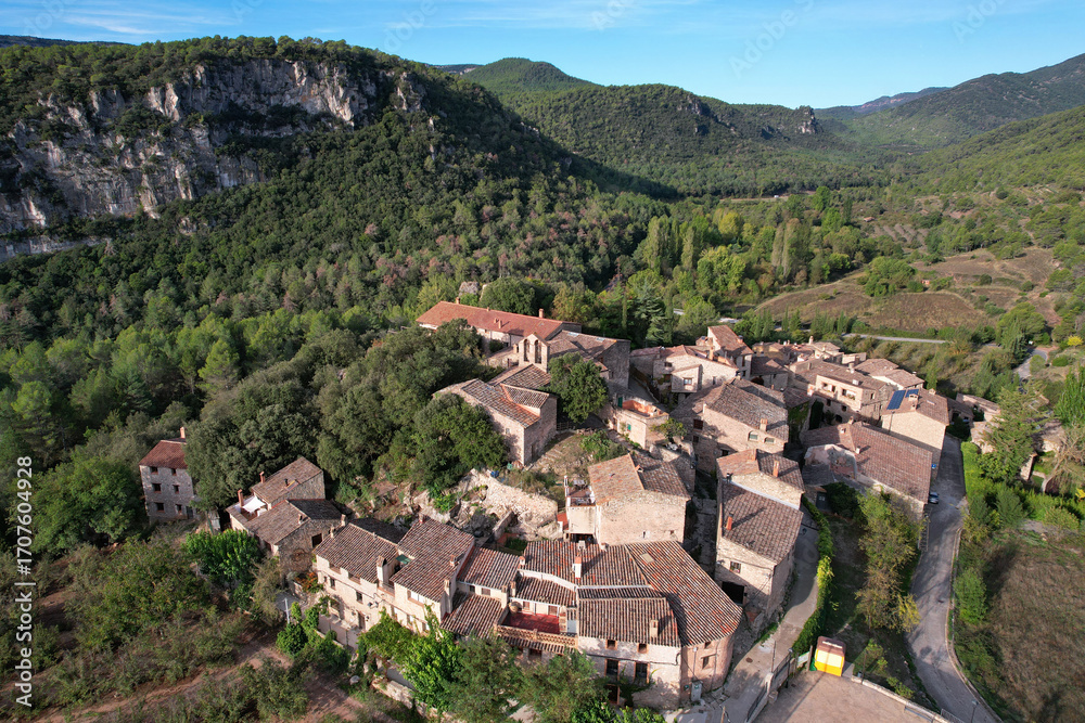 Fototapeta premium View of Farena village from above on sunny summer day. Tarragona Province, Spain.