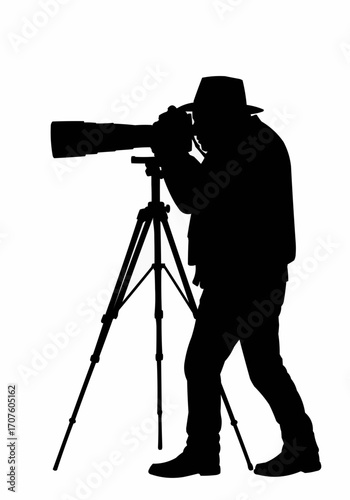 A photographer using a tripod to take a picture. 