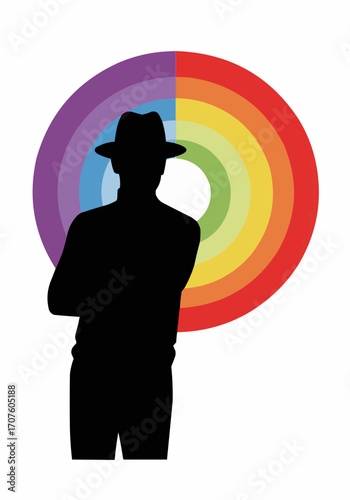Silhouette of a man in front of a rainbow.