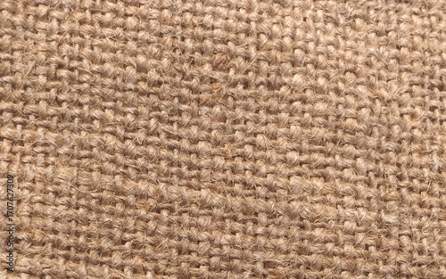 Jute pattern, rough burlap texture. Close-up of brown panorama view burlap background.