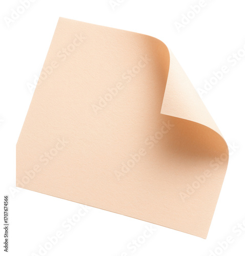 Folded corner of a light peach paper