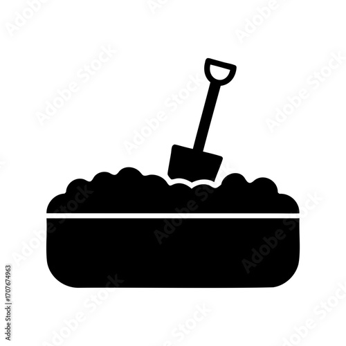 Black silhouette of a shovel in a container filled with dirt and soil