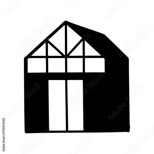 Silhouette of a barn with a unique roof and window design isolated