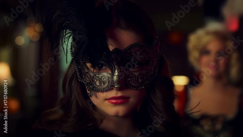 Woman wearing venetian mask at masquerade ball. Media