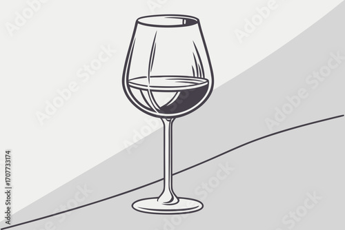 Elegant Wine Glass with Dark Red Liquid.