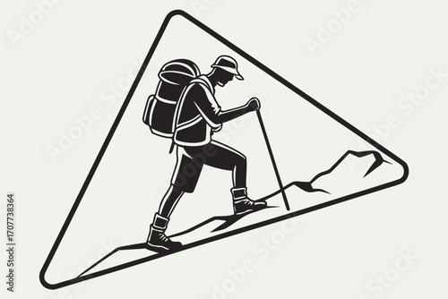 Silhouette of Hiker Ascending Mountain Peak.