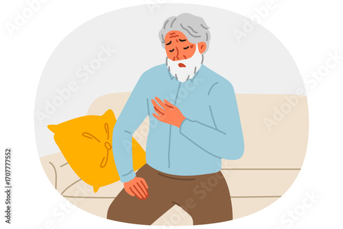 Elderly man feels pain in heart, sitting on couch and needs emergency medical care. Grandfather is yearning for myocardial infarction due to heart pain and problems with cardio exercise