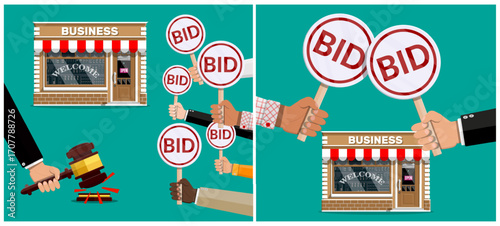 Man hand holding gavel and people holding bid signs at business auction. Commercial property sale. Public bidding.
