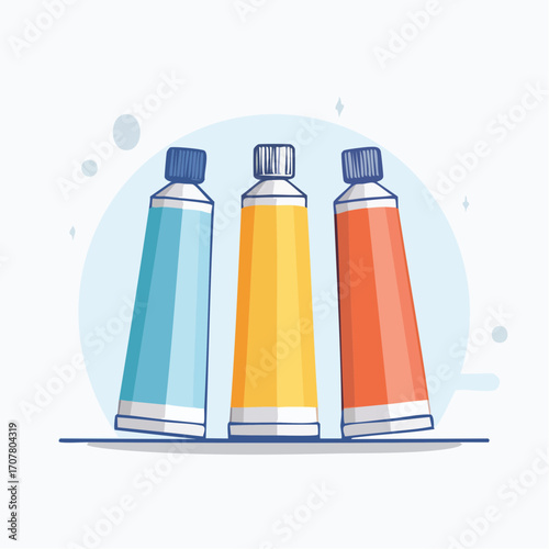 Three Paint Tubes Of Blue Yellow And Orange On White Surface
