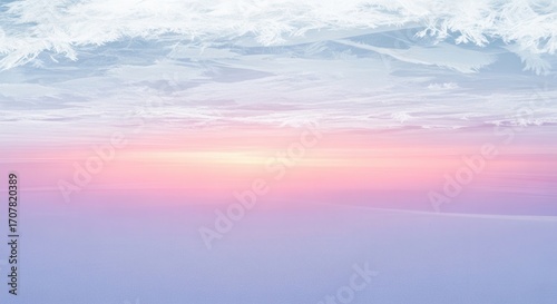Serene sunset sky with soft pink and purple hues over the horizon