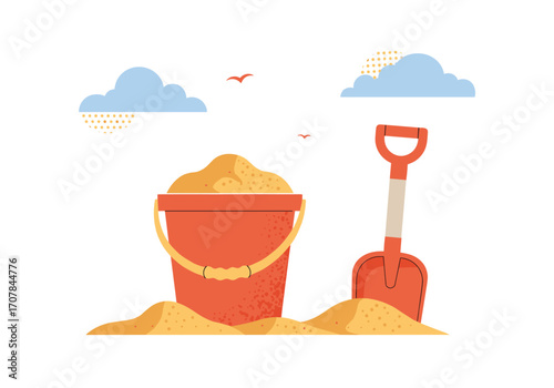 Fun at the beach with a bucket and shovel, making sandcastles under a bright summer sky