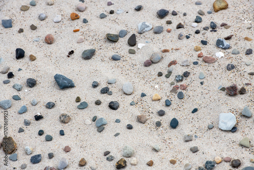 Pebbles on the beach as a background, closeup of photo