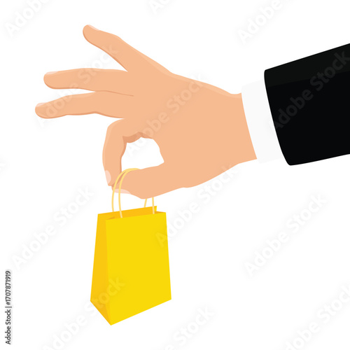 Businessman hand holding yellow paper shopping bag