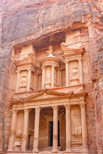 View of Al-Khazneh (The Treasury), one of the most elaborate temples in Petra, an ancient city of the Nabatean Kingdom, in Jordan. Vertically. 