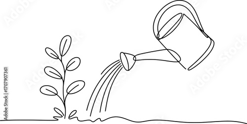 Plant being watered by a watering can pouring growth