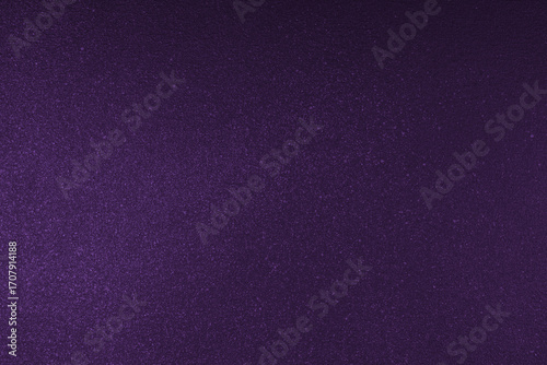 Abstract shiny, radiant texture background with different shades of dark purple color. Painted canvas, glitter concrete surface, studio backdrop, grainy textured effect