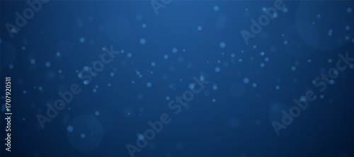 small light particles on a dark blue background