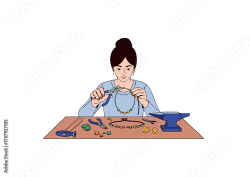 woman making jewelry with hand tools
